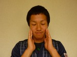 Cheek muscle massage of the surrounding oral